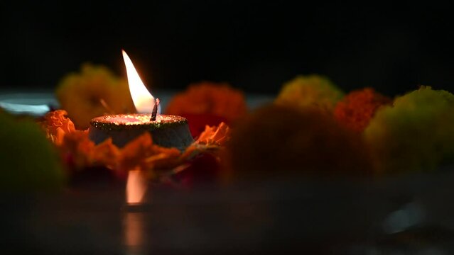 burning candle on a dark background