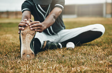 Baseball, player and stretching for game, training and workout on field, with ball and sportswear...