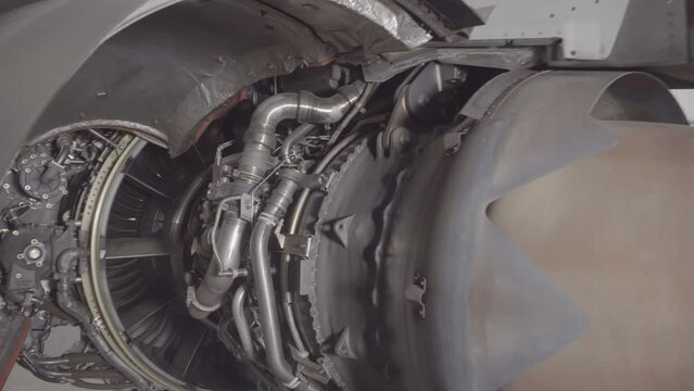 Aircraft engine in service. Passenger plane on regular service in the aircraft repair hangar