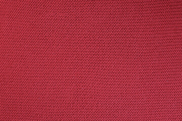 Red knitted fabric texture background