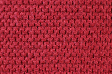 Red knitted fabric texture background