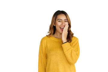 Fototapeta premium Attractive positive young asian brunette woman in yellow sweater on white background. wow or surprised