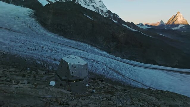 The Monte Rosa hut in Switzerland alps. Drone flight to the right