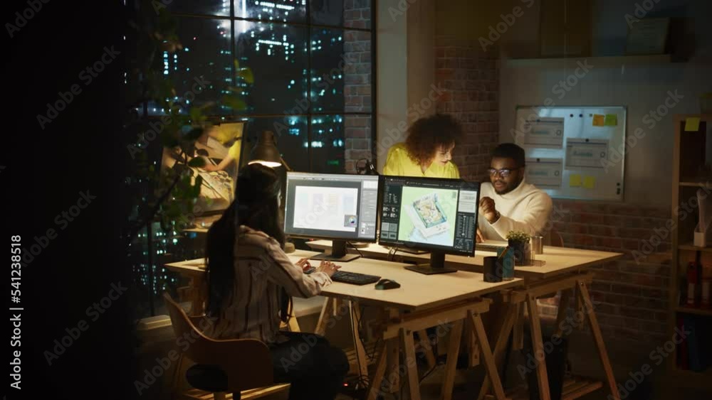 Aufkleber small diverse multiethnic group collaborate on a project and work together in an office at night. te
