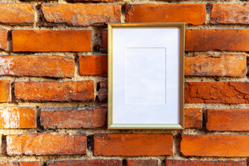 Empty frame mockup with copy space, old brick wall texture background