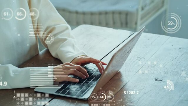 パソコンを使う女性と統計グラフ