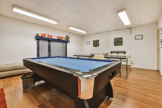 Lounge Area In Office With Pool And Tennis Table