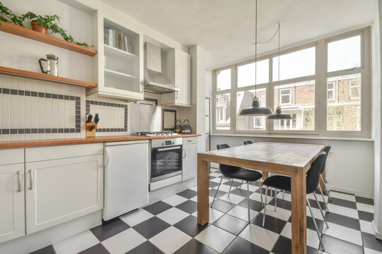 Modern kitchen with white cabinets