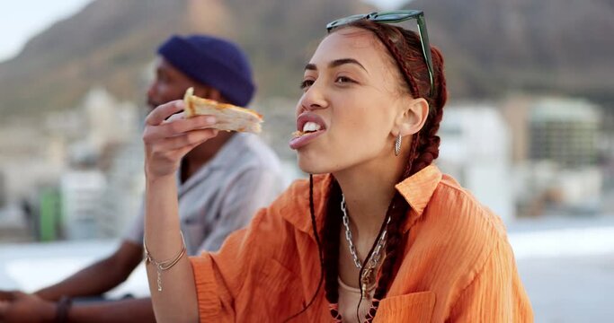 Pizza, rooftop and friends eating outdoor with cityscape for urban, gen z and youth lifestyle food. Happy, relax and hungry black people or woman and man with fast food and city buildings location