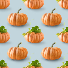 Seamless pattern of big pumpkins on orange background. Autumn harvest concept.