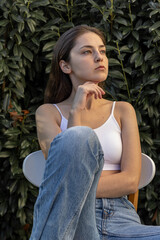 Portrait of a self-confident girl posing for a fashion gloss, advertising, branded stores