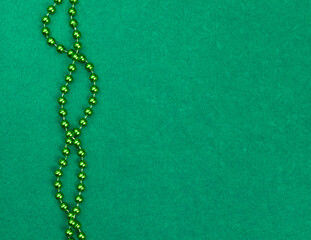 Fototapeta na wymiar Green necklace preparing for St Patrick day