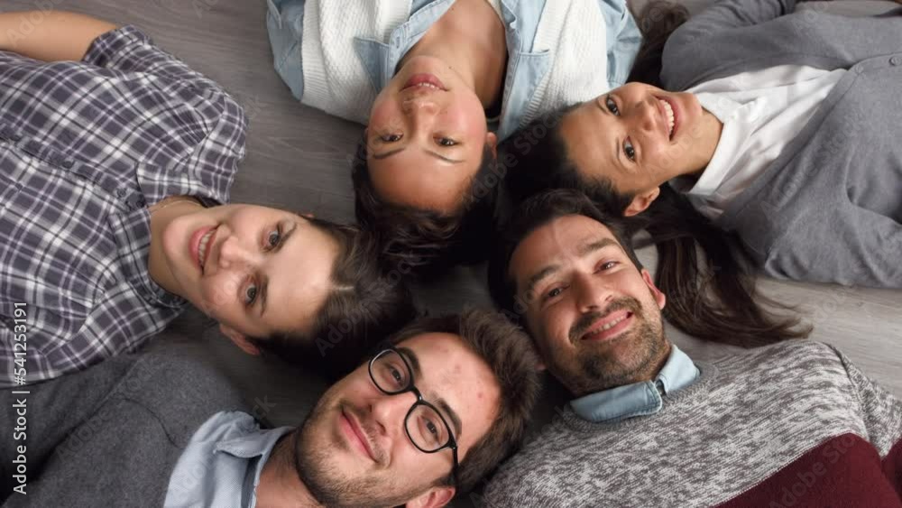 Poster Top view, business people and support circle on floor in team building, employee collaboration and worker trust. Portrait, smile or happy creative men, women and designers in company or office huddle