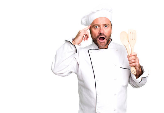 Middle Age Man Looking Surprised, Realizing A New Thought, Idea Or Concept. Chef And Tools Concept