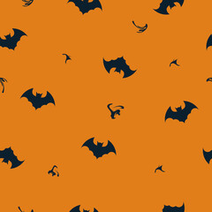 Seamless pattern with bat silhouette on orange background.