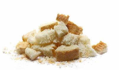 Bread crumbs pile, pieces and chunks isolated on white  