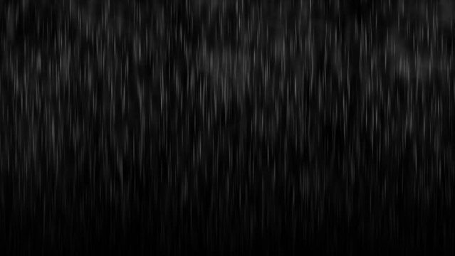 Smooth Rain Showery Raindrops Isolated on black background. Rain Overlay Background with Light on Top and Atmospheric  winter season smokes. Perfect for Dramatic and Cinematic Scenes 