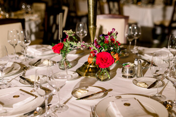 Colorful flower centerpiece on a luxury table at a wedding reception