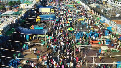 Chittagong, Bangladesh - 24 October 2022: Aerial view of people at local fish market in Chittagong, Bangladesh.