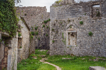 Fototapeta na wymiar Ruins and stone buildings of the old SPANJOLA fortress in Herceg Novi Montenegro