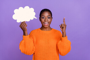 Photo of funny attractive girl hola paper cloud card direct finger up isolated on purple color background © deagreez