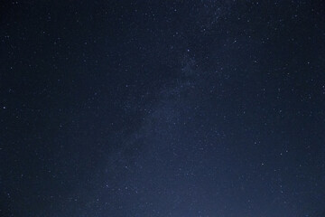 Moonlit sky with stars background