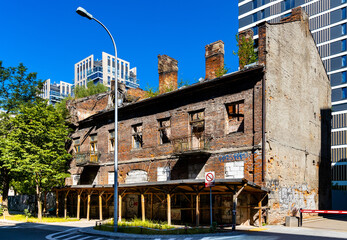 Ruined vintage tenement town houses with redevelopment potential along Lucka street in Wola business district of Warsaw city center in Poland © Art Media Factory