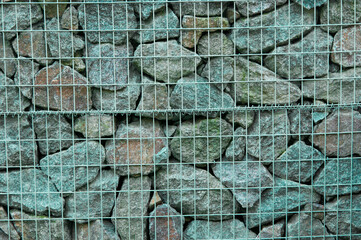 stone background. creative gray texture. colored mosaic. wall made of slabs. brick wall in loft style