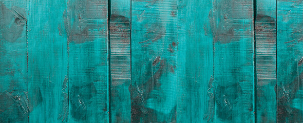 Fototapeta na wymiar wooden background. woody texture. surface with boards. parquet on the floor. colored doors. loft style canvas