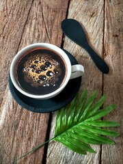 cup of coffee and spoon on the table