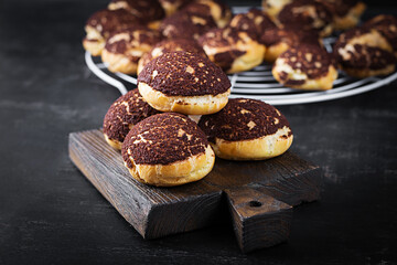 Shu Cake. Tasty profiterole with cream on the plate.  Copy space.