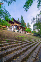 Fototapeta na wymiar view of Minh Thanh pagoda, a majestic Buddhist architectural structure in Pleiku city, Gia Lai province, Vietnam, text in photo mean peace, compassion, forgiveness. Travel concept