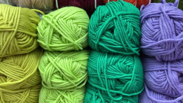 Balls of yarn for knitting. The concept of needlework and knitting. Selective focus