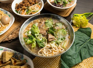 Spicy Lamb chop noodles served in dish isolated on table side view of taiwan food