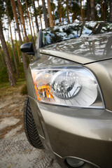 https://www.shutterstock.com/ru/image-photo/vertical-photo-headlight-modern-prestigious-car-2213088665