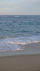 sand path to North sea at sunset