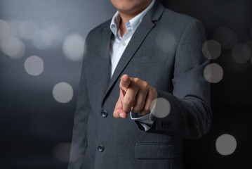 Double exposure of close up businessman pushing, touching on black and gray background