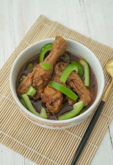 Delicious spicy chicken with soy sauce and paprica in selective focus
