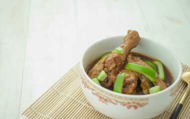 Delicious spicy chicken with soy sauce and paprica in selective focus