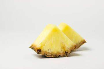 Slice of pineapple on a white background. Tropical Fruit