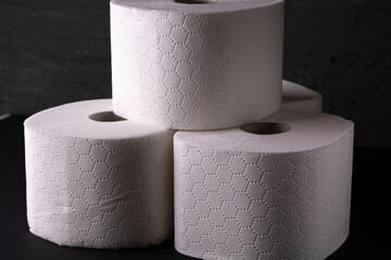 white toilet paper on a black background