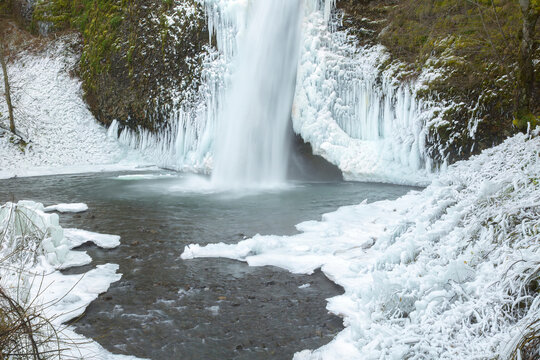 Horsetail falls with icycles and frozen foilage after a week of sub-zero temperatures, Columbia River Gorge National Scenic Area, Oregon