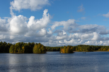 Finnish Lake landscape from Teijo National Park in autumn with a small boat on the lake