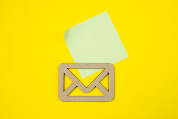 Envelope and email symbol on a yellow background. Concept email address. Internet technologies and...