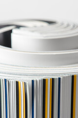 Rolled magazine close-up, printed press