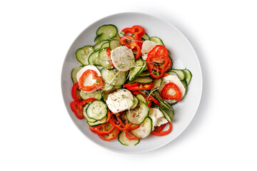 Vegetarian salad with sweet peppers, cucumbers, feta cheese, micro greens. Sliced salad. Isolated on white.