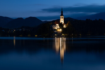 Fototapeta na wymiar Church of the Assumption of Mary, Lake Bled, blue hour photo, dusk