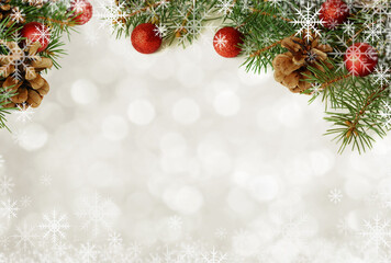 Obraz na płótnie Canvas Christmas decorations on white bokeh background with snowflakes