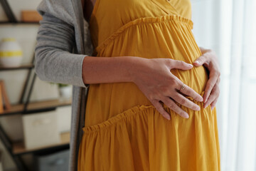 Obraz premium Happy Pregnancy and Motherhood