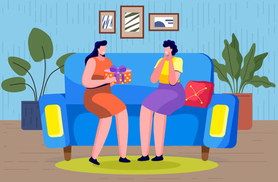 Holiday congratulation concept. Woman presents wrapped gift at festive party. Friends giving presents. Happy smiling women chatting and relaxing together at home. Lady giving gift to her friend